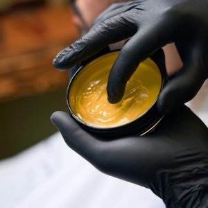 hairdresser-in-black-gloves-using-styling-tool-for-2025-03-10-01-05-05-utc (1) (1)